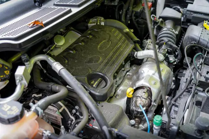 Engine oil can leak due to a loose or faulty oil filler cap.